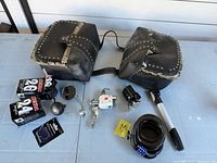 Overview of all items on table including panniers, tubes, accessories