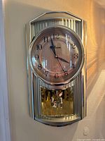 Front view of Banda wall clock showing full design