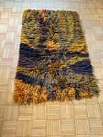 Full view of shag throw blanket on floor