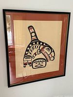 Full view of framed killer whale print on wall