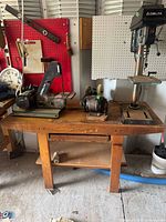 Front view of Sunbeam workbench with tools on top (not included)