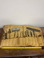 Overview of satchel with all tools laid out