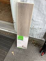 Front of sealed box showing shelf and basic details