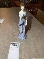 Front view of Royal Doulton Harmony figurine on table