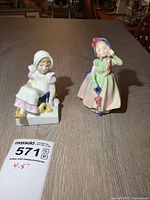Both Royal Doulton figurines front view