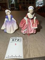 Both Royal Doulton figurines front view