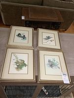 Four framed Loates prints overview