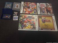 Group shot of all game cases and loose cartridges