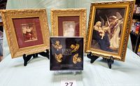 Group shot of three framed prints and boxed napkin rings