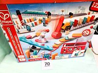 Front of Hape Robot Factory Domino box showing contents and 122 pcs count