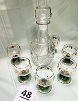 group view of decanter with stopper and six roemer goblets
