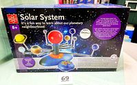 Front of boxed Edu-Toys Solar System showing product image and features
