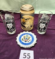 Group shot: two JFK glasses, Bald Eagle stein, 5" US Seal plate