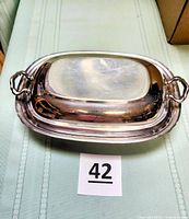 Top view of assembled silver-plated covered dish