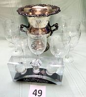 Lot overview showing ice bucket, eight goblets, boxed acrylic stoppers