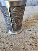 Side view showing embossed exterior design and tapered shape