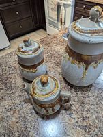 Full view of three-piece Laurentian stoneware set on countertop