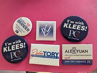 Front view of six Progressive Conservative campaign pins