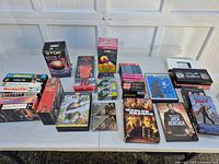 Overview of all blank media, VHS movies and DVDs on table