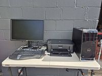 Full set: Dell tower, monitor, Canon printer, keyboard on table