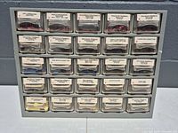 Front view of 24-drawer cabinet showing all labeled drawers
