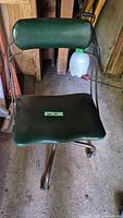 Front view of green vinyl metal office chair