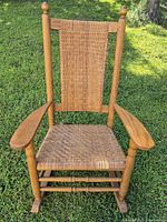 Full front view of rocking chair on grass