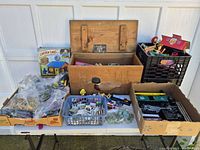 Overall lot on table showing trunk, crates, boxes, bags, baskets