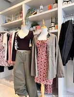 Display mannequins and apparel in Sweet Pea Boutique representing store merchandise