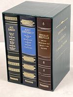 Slipcased set showing all three book spines and slipcase