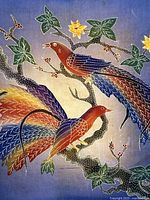 Close view of batik showing bird and floral design details