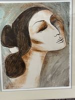 Close-up of portrait showing subject’s head and brushwork