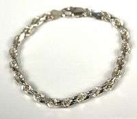 Full view of rope chain bracelet formed in circle