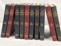 Front view of all ten volumes showing spines and titles
