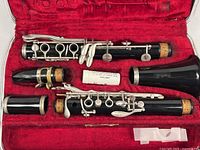Open case showing clarinet sections and interior