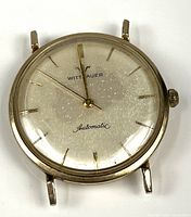 Front view of Wittnauer automatic watch showing dial, hands, markers