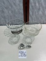 Group view of five glass items
