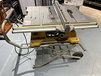 Full view of Ridgid table saw on folding wheeled stand