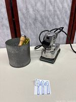 Full lot view showing sander and hand tools