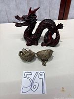 Incense burner closed and dragon figurine together