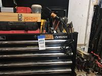 Front of Husky tool chest with tools on top