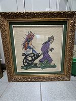 Full view of framed embroidery showing entire rickshaw scene and frame