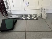 Lot overview showing bookends, Spontan rails, CD wallet