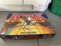 Risk board game box top showing title and artwork