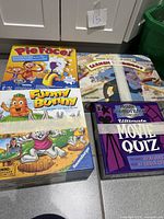 All three boxed games taped closed: Pie Face, Funny Bunny, Ultimate Movie Quiz