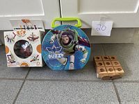 Zoob set box, Buzz Lightyear tin, wooden tic tac toe board