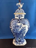 Front view of lidded blue-and-white porcelain jar