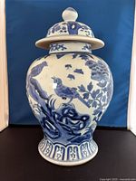Front view of blue-and-white porcelain ginger jar with lid
