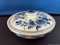 Covered dish with lid showing floral design
