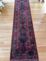 Full view of entire runner rug on hardwood floor